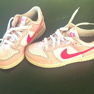 Hot pink and light Nike sneakers